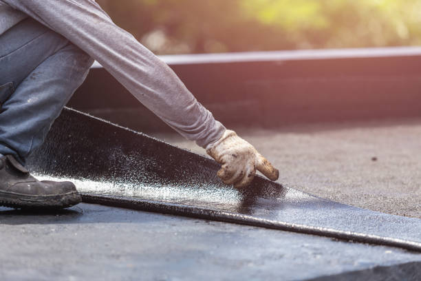 Professional Basement Waterproofing technician working in Red Bank, TN